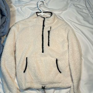 white sweater